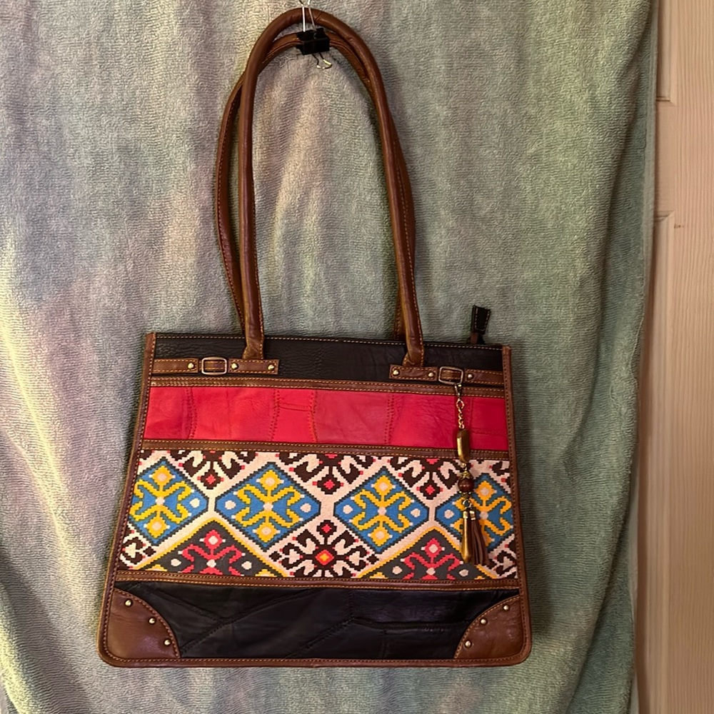 Large colorful handbag.